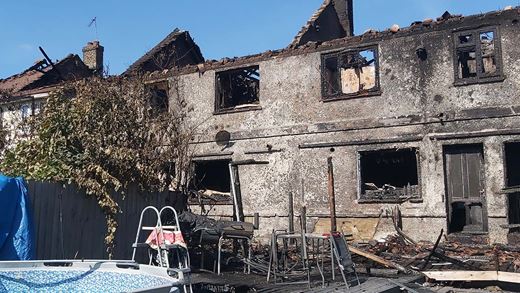 Ms.Mays house after fire. Missing roof
