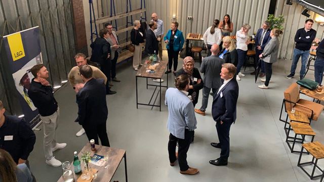 L&Q colleagues talking with our development partners